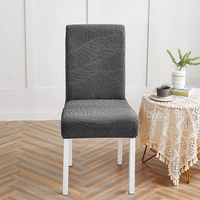 Wasserfester Stuhlbezug mit anthrazitfarbenem Blattmuster