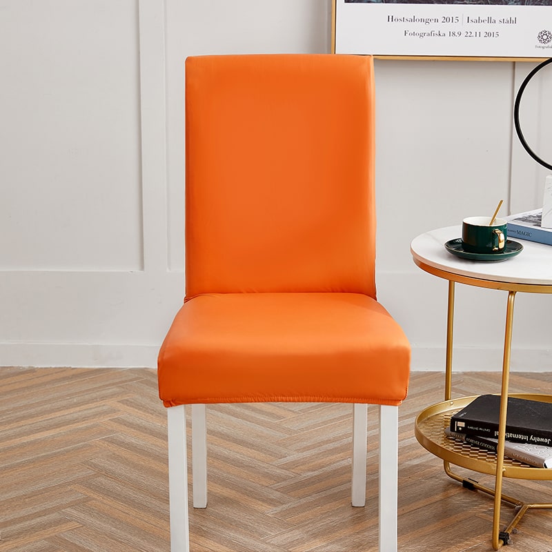 Orangefarbener Stuhlbezug aus Kunstleder